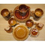 A retro Hornsea part tea service with oil and vinegar bottles.