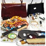 A quantity of costume jewellery to include necklaces, bracelets, hat pins etc, a silver comb case,