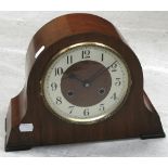 A mid 20th century mahogany Haller mantel clock, silver dial set with Arabic numerals.