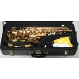A cased Mirage Alto saxophone, height 64cm.