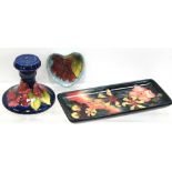 A Moorcroft heart shape Hibiscus on pale blue ground pin dish,