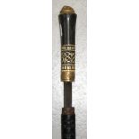 A late 19th century ebonised sword stick with carved ivory decoration to the handle and a yellow