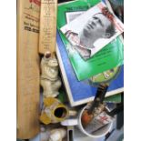 A collection of cricket memorabilia and books to include a cricket bat signed by the Kent team and