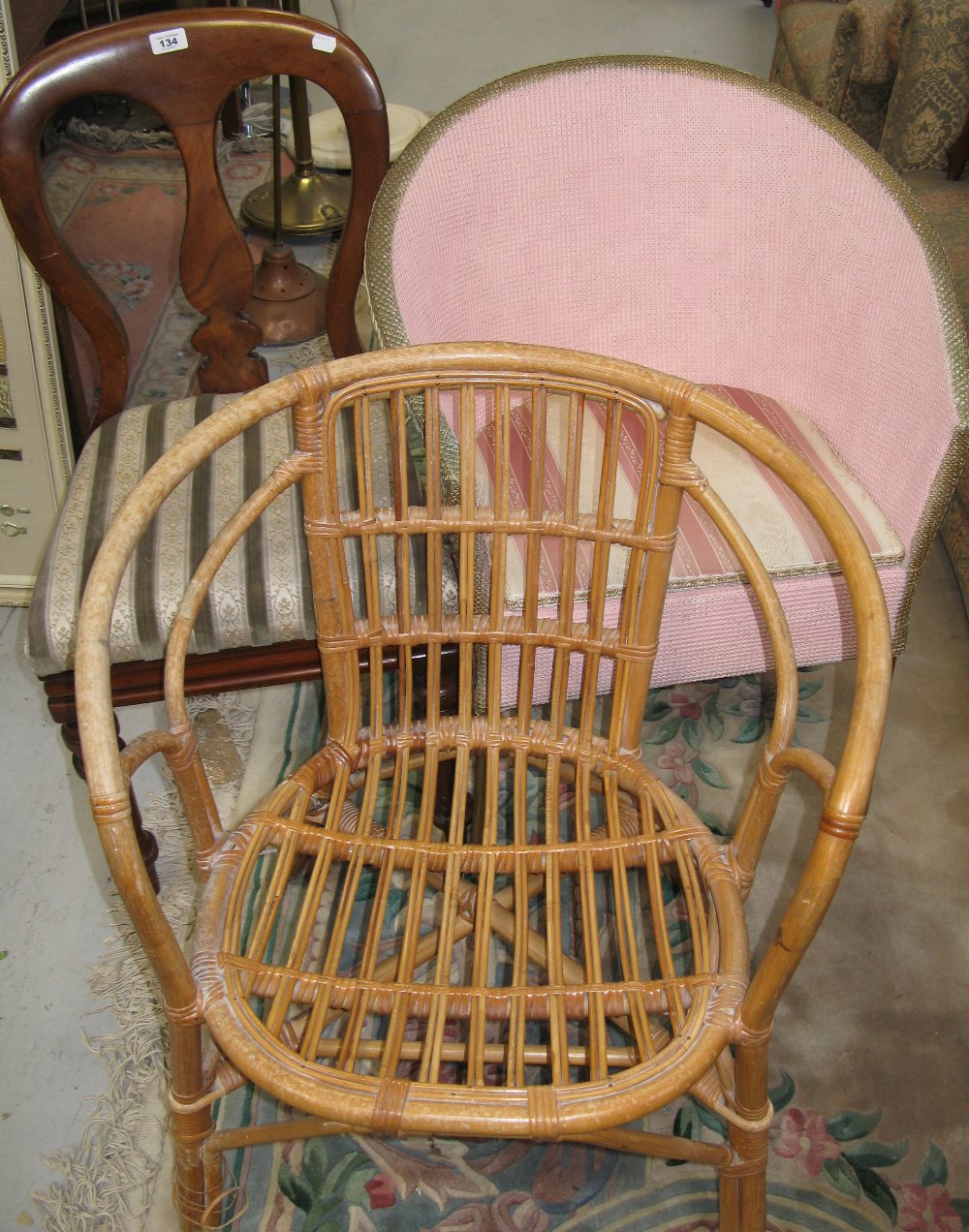 A wicker chair, a Lloyd Loom style chair and a mahogany balloon back chair (3).
