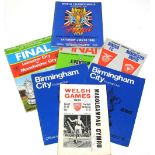 Twenty six issues of "Reds-Anfield Review" match programmes from the 1990s, eight from the 1960s,