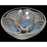 A Rene Lalique glass bowl with scallop design, signed to the base "R Lalique France", diameter 21cm.