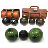 A 19th century case set of Crown Green GK bowling balls and one other case of Crown Green bowling