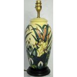 A contemporary Moorcroft cream ground Bulrush pattern lamp with original tag, height 37cm.