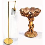 A modern brass anglepoise lamp and a gilded shell planter with cherub support (2).