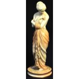 A Royal Worcester figurine of a semi naked female, puce mark to the base no. 2/57, height 26cm.