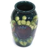 A Moorcroft Finches on green/blue ground baluster vase, impressed marks to base. CONDITION REPORT No