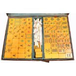 A c.1930s Chinese cased Mahjong set.