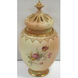 A Royal Worcester blush ivory baluster vase with cover and additional crown shaped pierced cover,