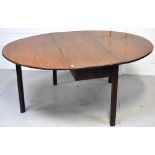 A George III mahogany oval drop leaf dining table, length 160cm.