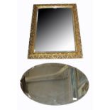 A modern gilt framed wall mirror,