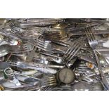 A large quantity of plated flatware.