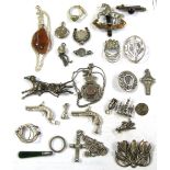 A quantity of silver and white metal jewellery to include a pair of miniature duelling pistols,