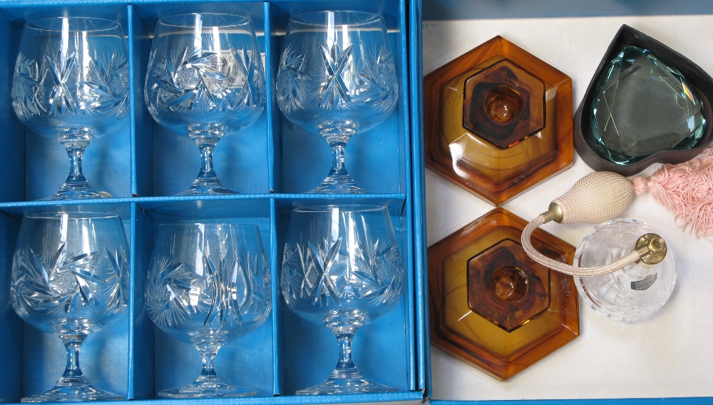 A small quantity of glass to include a boxed set of six glasses, candle holders, vases etc.