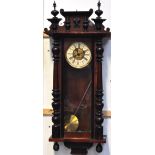 A late 19th early 20th century Vienna style wall clock,