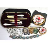 A small quantity of costume jewellery to include necklaces, a Victorian silver brooch, earrings,