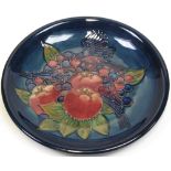 A Moorcroft Finches on dark blue ground plate,