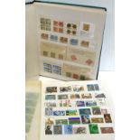 Six albums of world and United Kingdom postage stamps and a quantity of loose stamps.