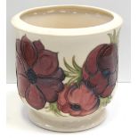 A Moorcroft Anemone on cream ground jardinière, Walter Moorcroft initials and impressed mark,