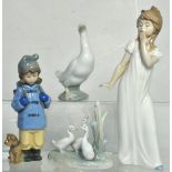 A Nao figurine of a young girl yawning, a young girl with her dog,