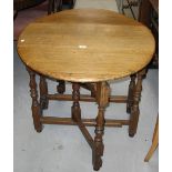 A 20th century oak gateleg table of small proportions, width 82cm.