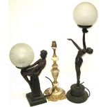 Three table lamps to include two Art Deco figural lamps and one onyx and gilded example (3).