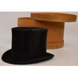An Alfred Pellett Ltd silk top hat in cardboard box, internal measurements approx 20 x 16cm.