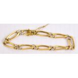 An 18ct gold diamond chip set open work bracelet, length 19.5cm, approx 22.6g.