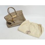 HERMES; a grey/olive green clemence leather Birkin handbag with gold coloured hardware and white