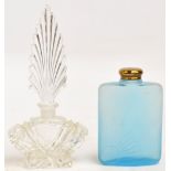 An Art Deco clear cut glass perfume bottle with large fan shaped stopper, height 21cm,