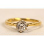 An 18ct yellow gold diamonds solitaire ring, the stone approx 0.