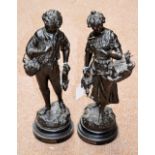 After OMERTH; a pair of late 19th century French spelter figures,