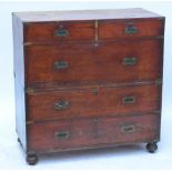 A 19th century mahogany and brass bound two section military chest with two short over three long