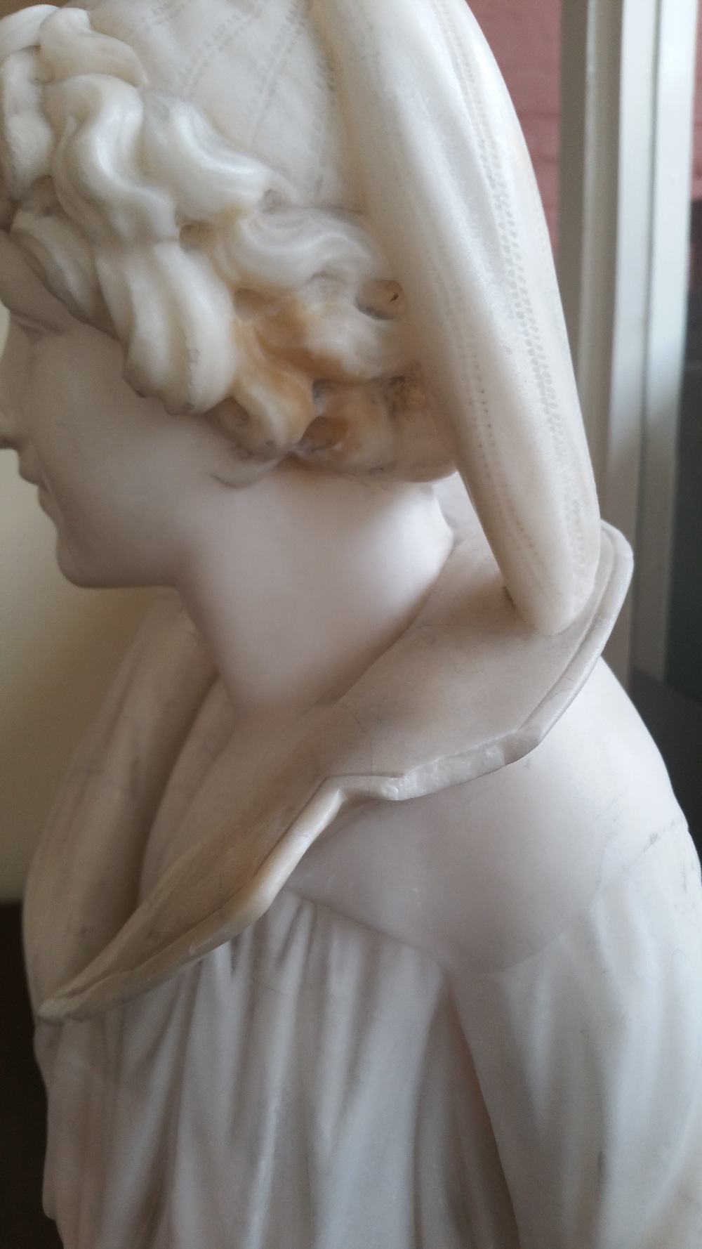 A late 19th/early 20th century carrara alabaster figure of a young fisherman modelled with a net - Image 7 of 15