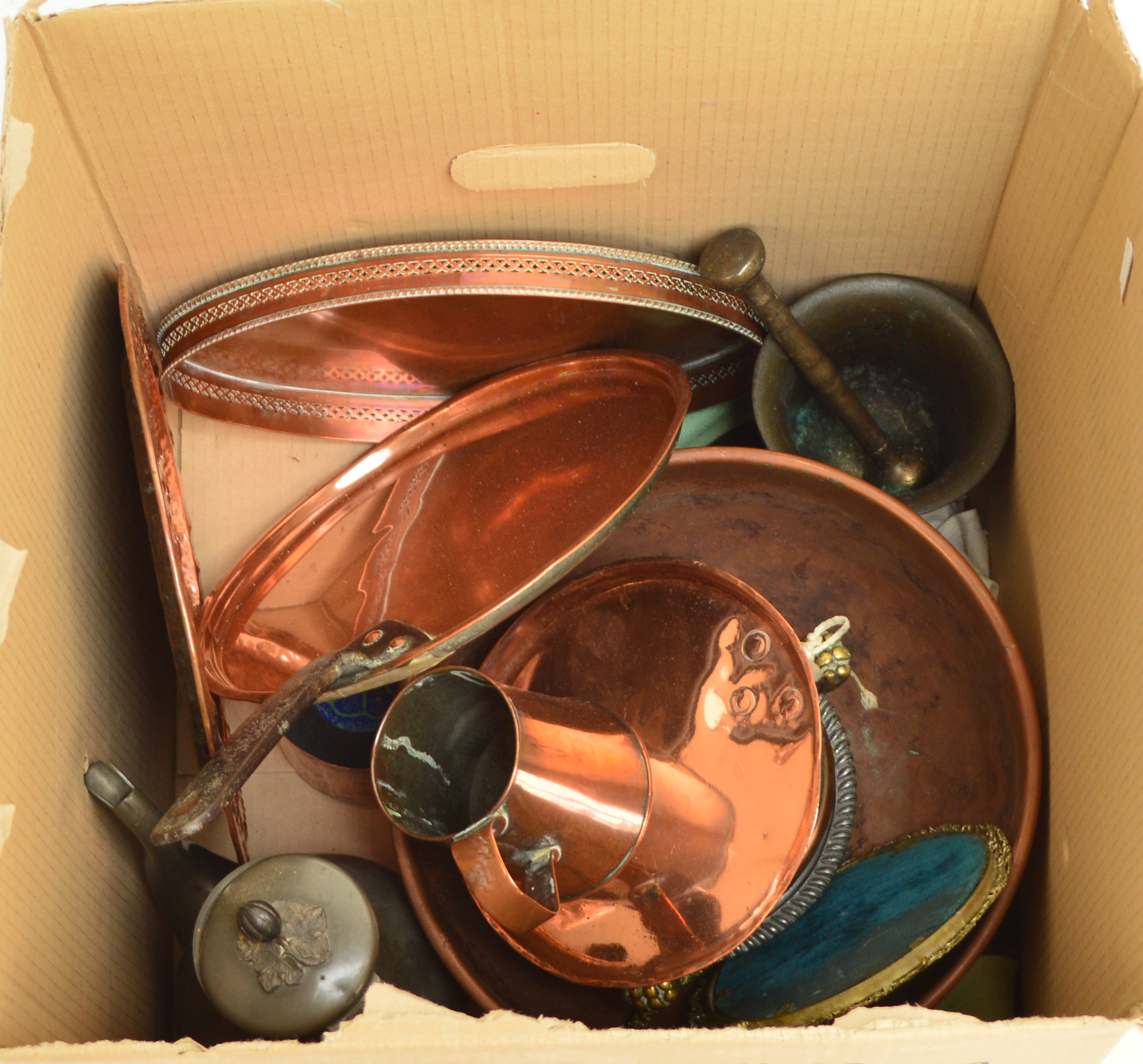 A collection of predominantly copper metalware including a large bowl,