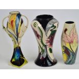 Three pieces of Black Ryden floral painted pottery comprising vase, height 20.5cm, dated 2003,