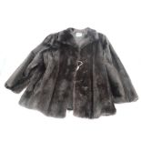 A lady's Saga mink half length fur coat with silk lining.