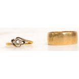 A 9ct gold wedding band and a 9ct gold ring (stones missing), approx 5.5g (2).