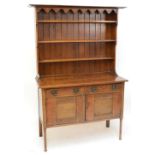 An Arts and Crafts oak dresser,