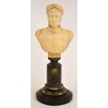 A late 19th century carved alabaster bust "Dante", raised on turned pedestal and wooden plinth,