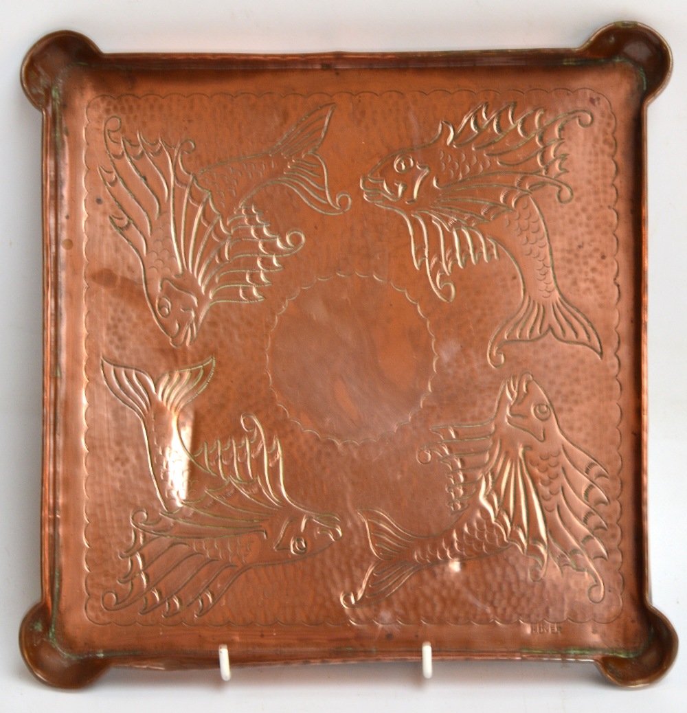 HERBERT DYER (1898-1974); an Arts and Crafts square hammered copper tray with lobed corners,