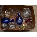 A group of predominantly clear cut glass items, including two decanters,