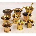 A collection of nine 18th century and 19th century bronze, gun metal and brass pestles and mortars,