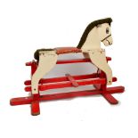 A 1950s/60s trestle rocking horse on painted frame, length approx 108cm.