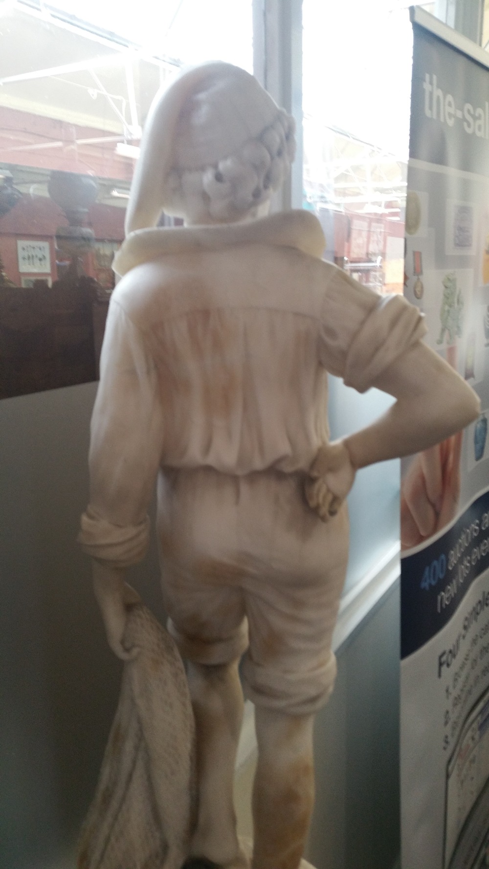 A late 19th/early 20th century carrara alabaster figure of a young fisherman modelled with a net - Image 10 of 15
