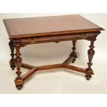 A late Victorian mahogany library table with single shaped drawer,